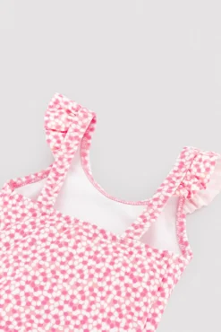 Bañador bebé niña detalles volantes estampado flores rosa