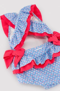 Bañador bebé niña detalles volantes y lazos estampado flores
