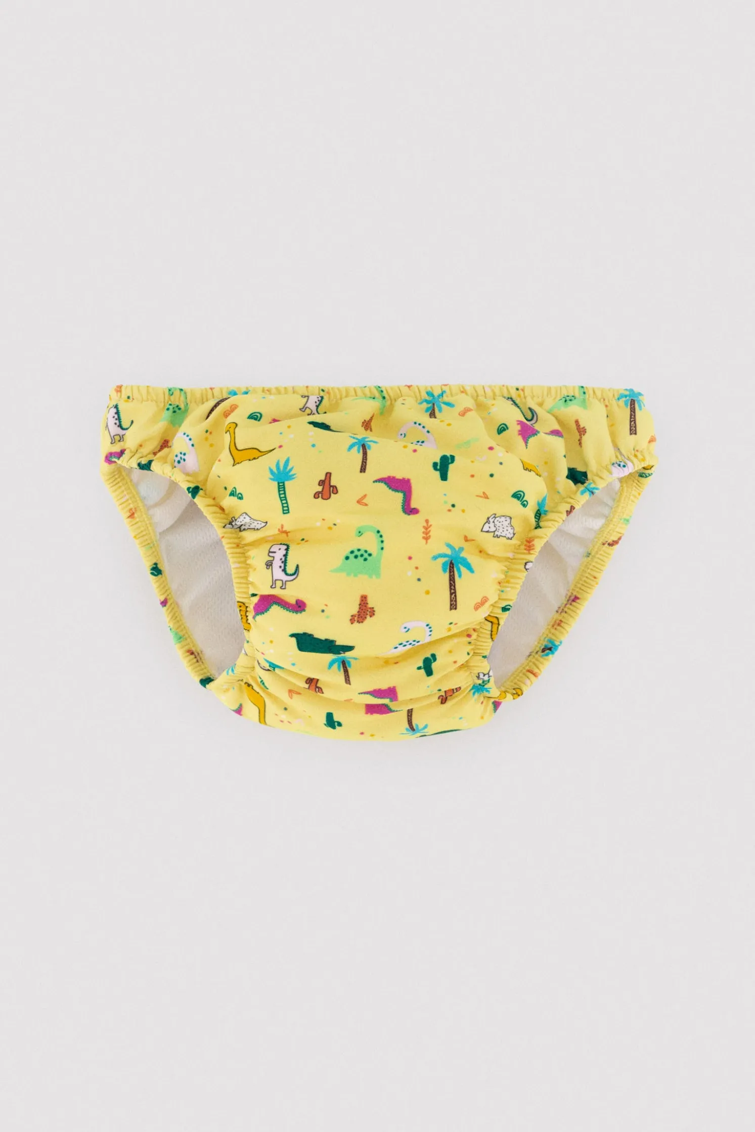 Bañador culetín antifugas bebé estampado dinosaurios amarillo