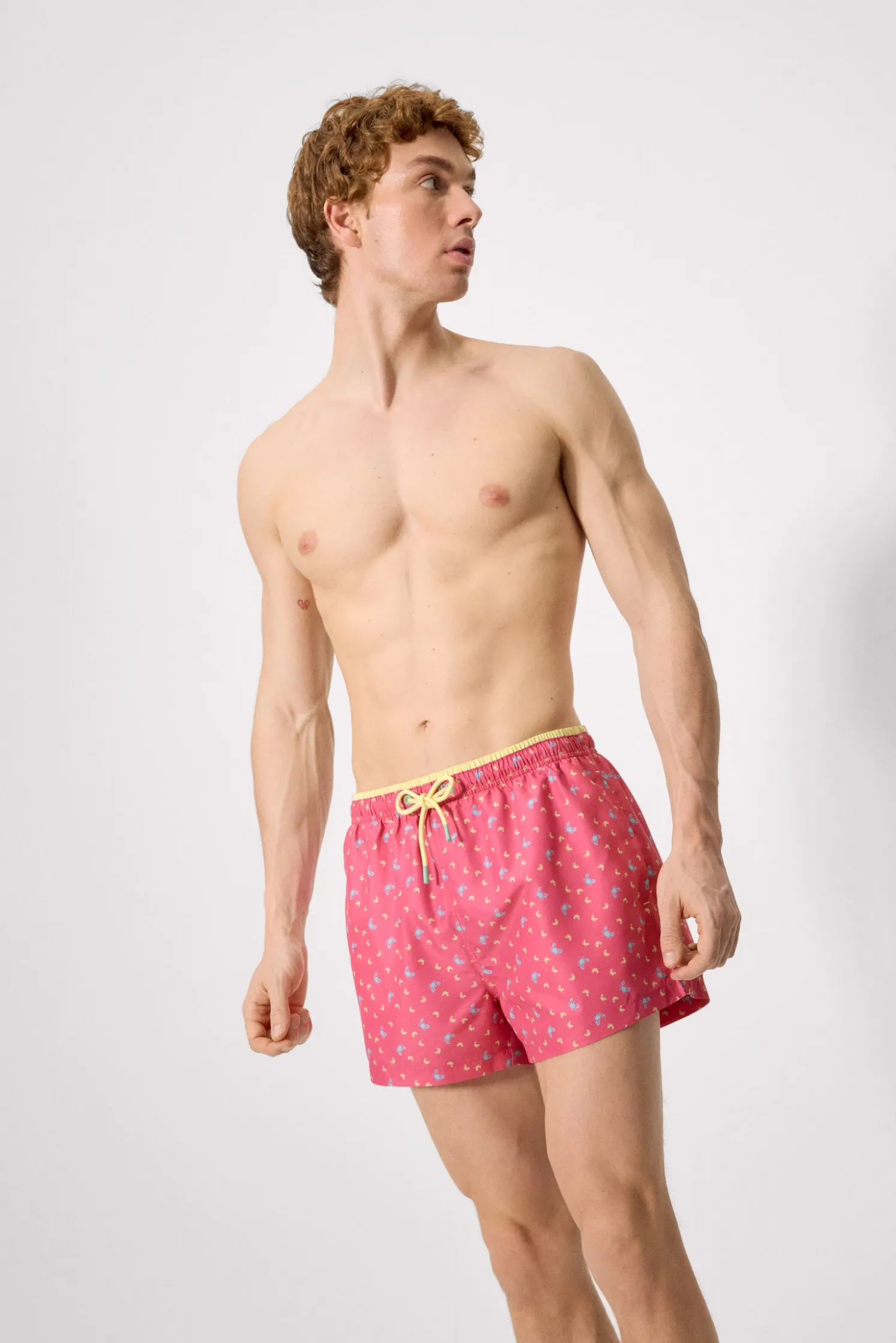 Bañador medio estampado cangrejos rosa