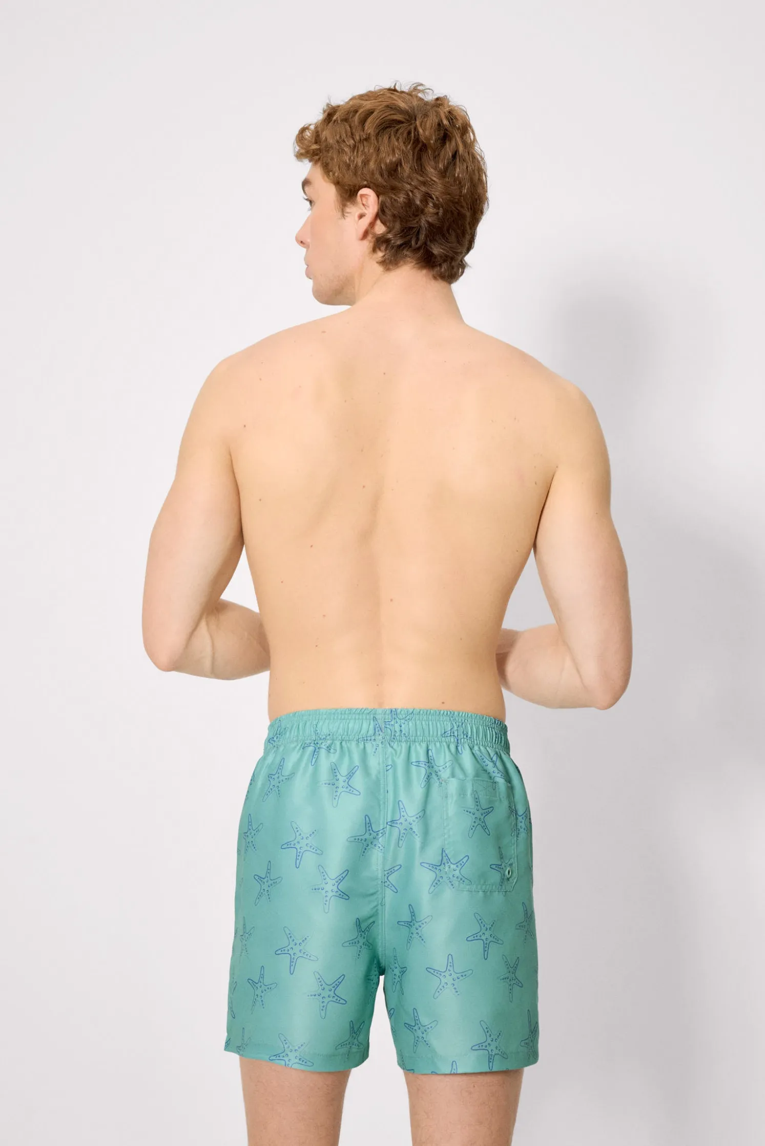 Bañador medio estampado estrellas mar verde