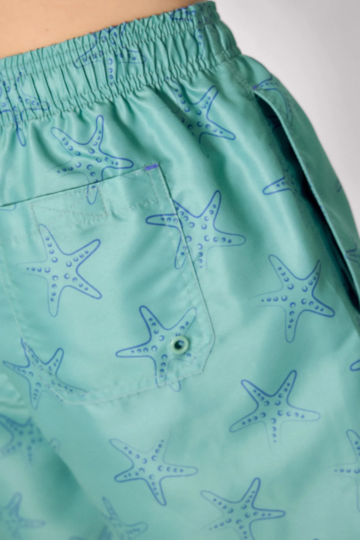 Bañador medio estampado estrellas mar verde