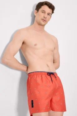 Bañador medio estampado pingüinos naranja