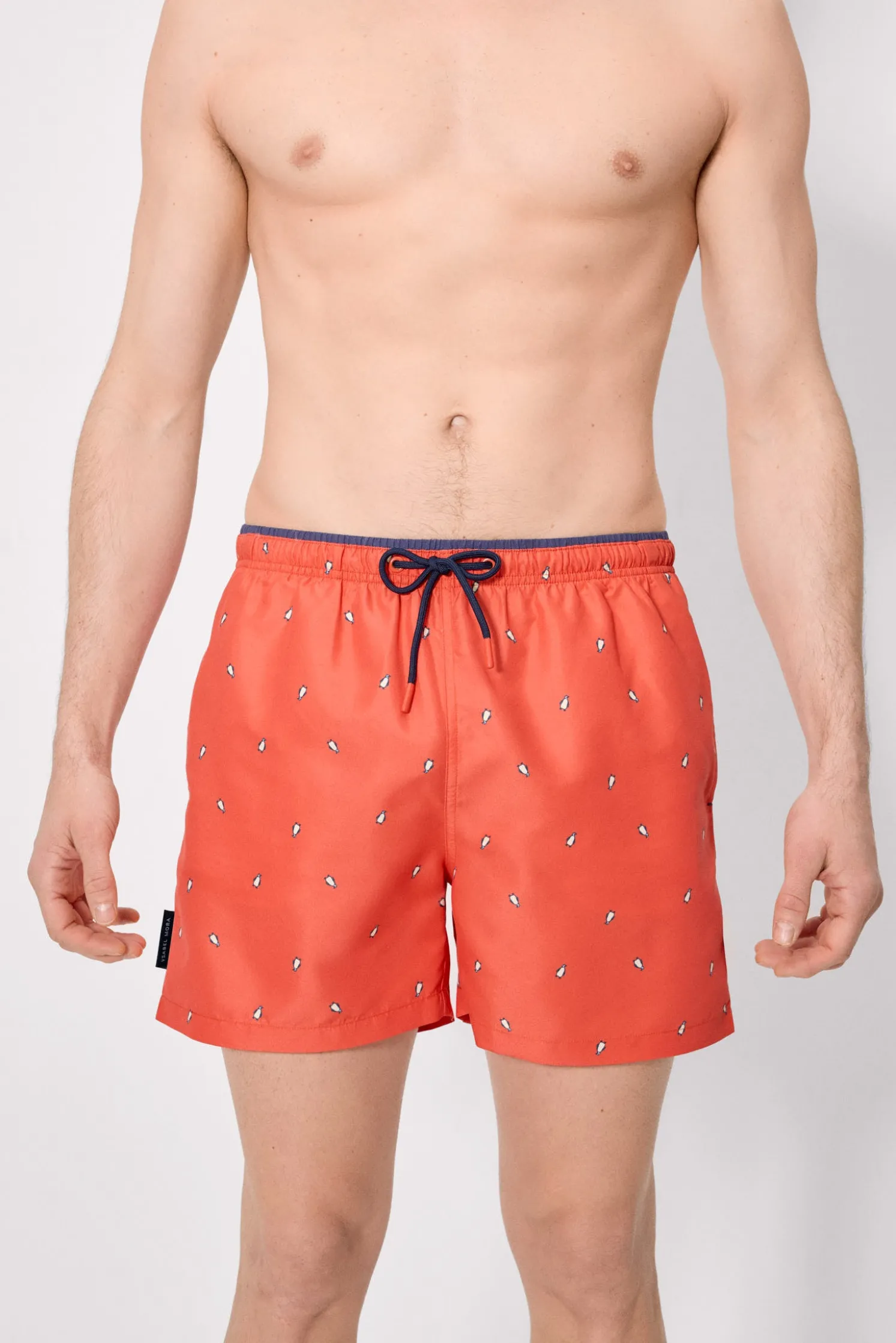 Bañador medio estampado pingüinos naranja