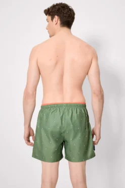 Bañador medio estampado pingüinos verde