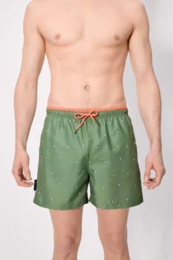 Bañador medio estampado pingüinos verde