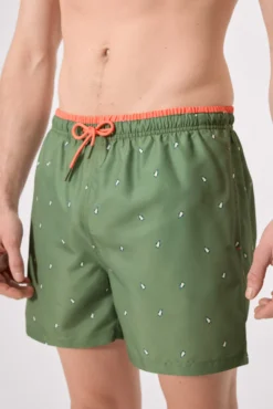 Bañador medio estampado pingüinos verde