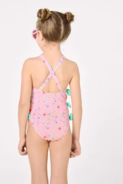 Bañador niña detalle cut-out y lazos estampado veraniego rosa