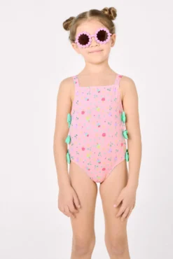 Bañador niña detalle cut-out y lazos estampado veraniego rosa