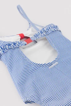 Bañador niña detalle lazo y volantes estampado rayas
