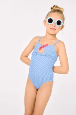 Bañador niña detalle lazo y volantes estampado rayas