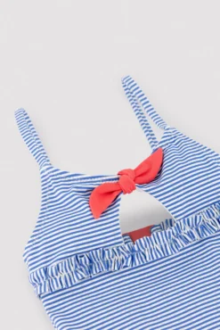Bañador niña detalle lazo y volantes estampado rayas