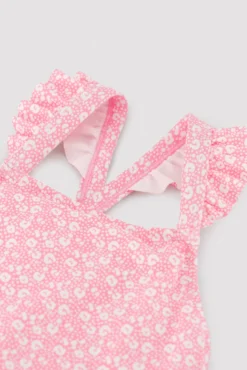 Bañador niña detalles volantes y tirantes cruzados estampado leopardo rosa