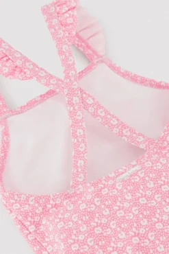 Bañador niña detalles volantes y tirantes cruzados estampado leopardo rosa