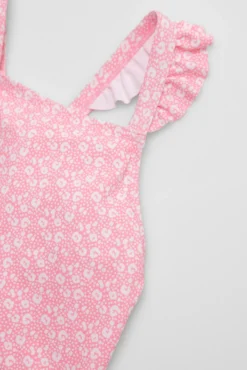 Bañador niña detalles volantes y tirantes cruzados estampado leopardo rosa