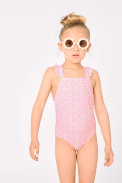 Bañador niña detalles volantes y tirantes cruzados estampado leopardo rosa