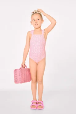 Bañador niña detalles volantes y tirantes cruzados estampado leopardo rosa