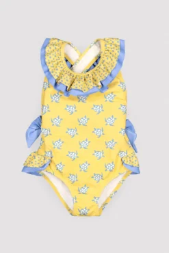 Bañador niña detalles volantes y lazos estampado tortugas amarillo