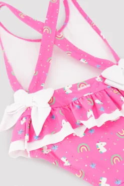 Bañador niña detalles volantes y lazos estampado unicornios rosa