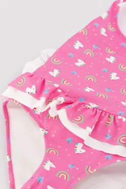 Bañador niña detalles volantes y lazos estampado unicornios rosa