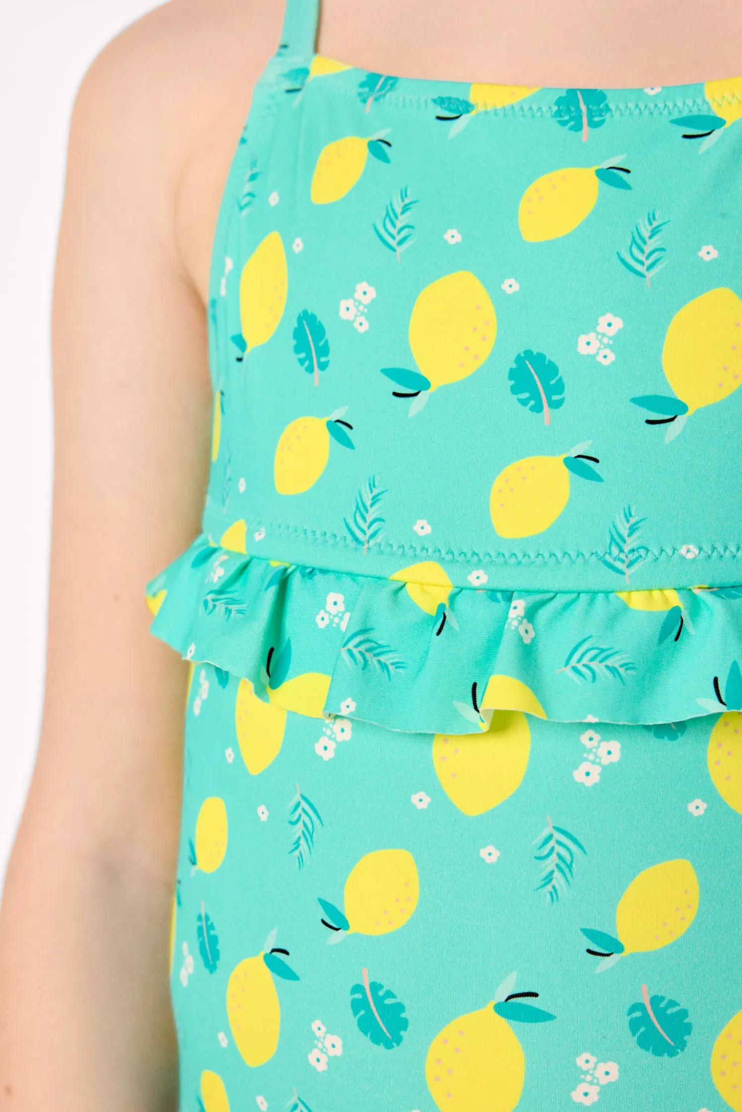 Bañador niña detalle volante estampado limones