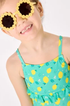 Bañador niña detalle volante estampado limones