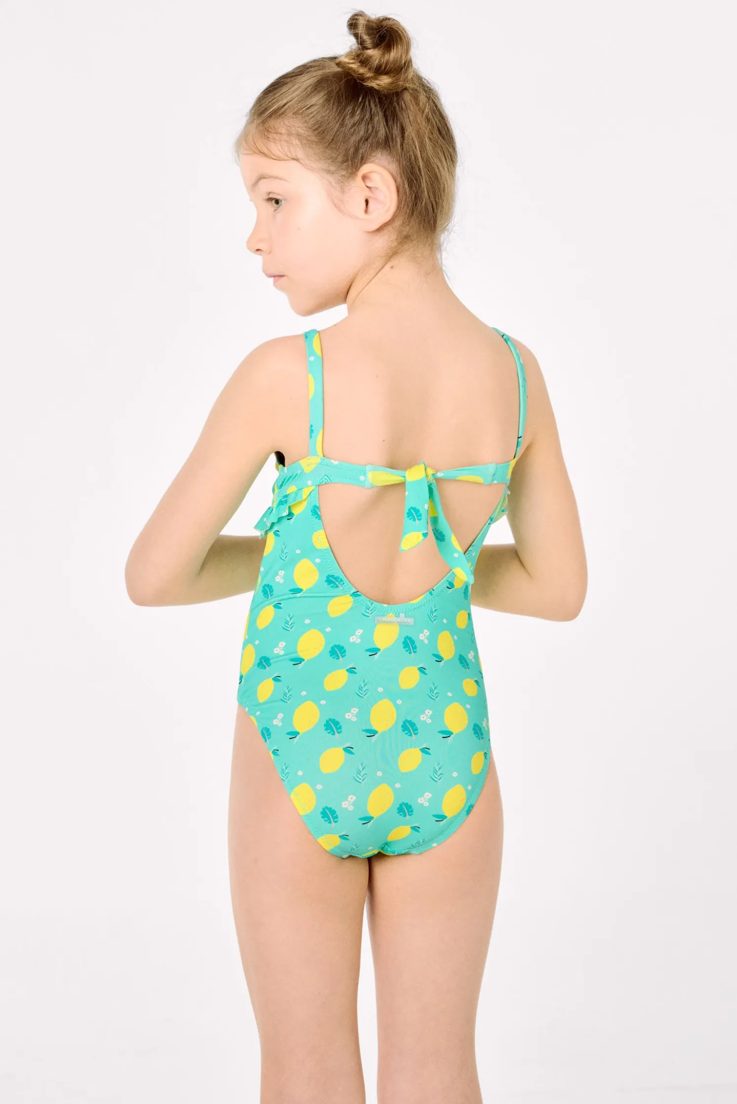 Bañador niña detalle volante estampado limones