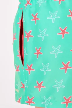 Bañador niño corto estampado estrellas marinas turquesa