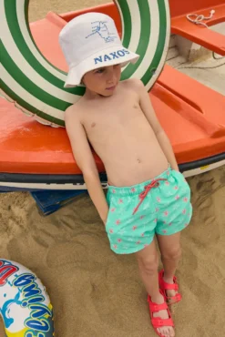 Bañador niño corto estampado estrellas marinas turquesa
