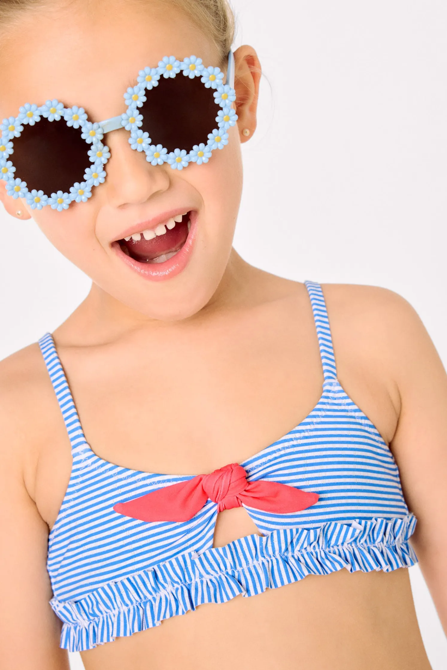 Bikini niña detalle lazo y fruncidos estampado rayas