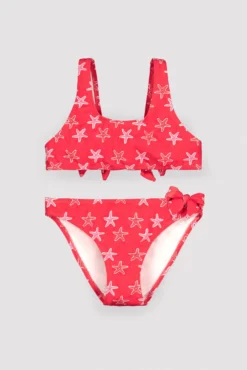 Bikini niña detalles volantes y lazos estampado estrellas marinas rojo