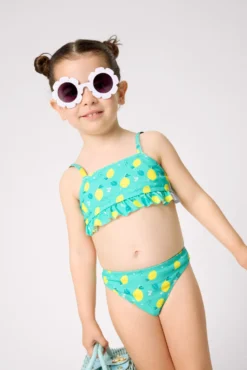 Bikini niña detalle volante estampado limones