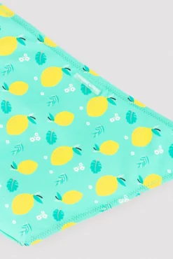 Bikini niña detalle volante estampado limones