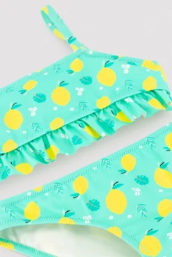 Bikini niña detalle volante estampado limones