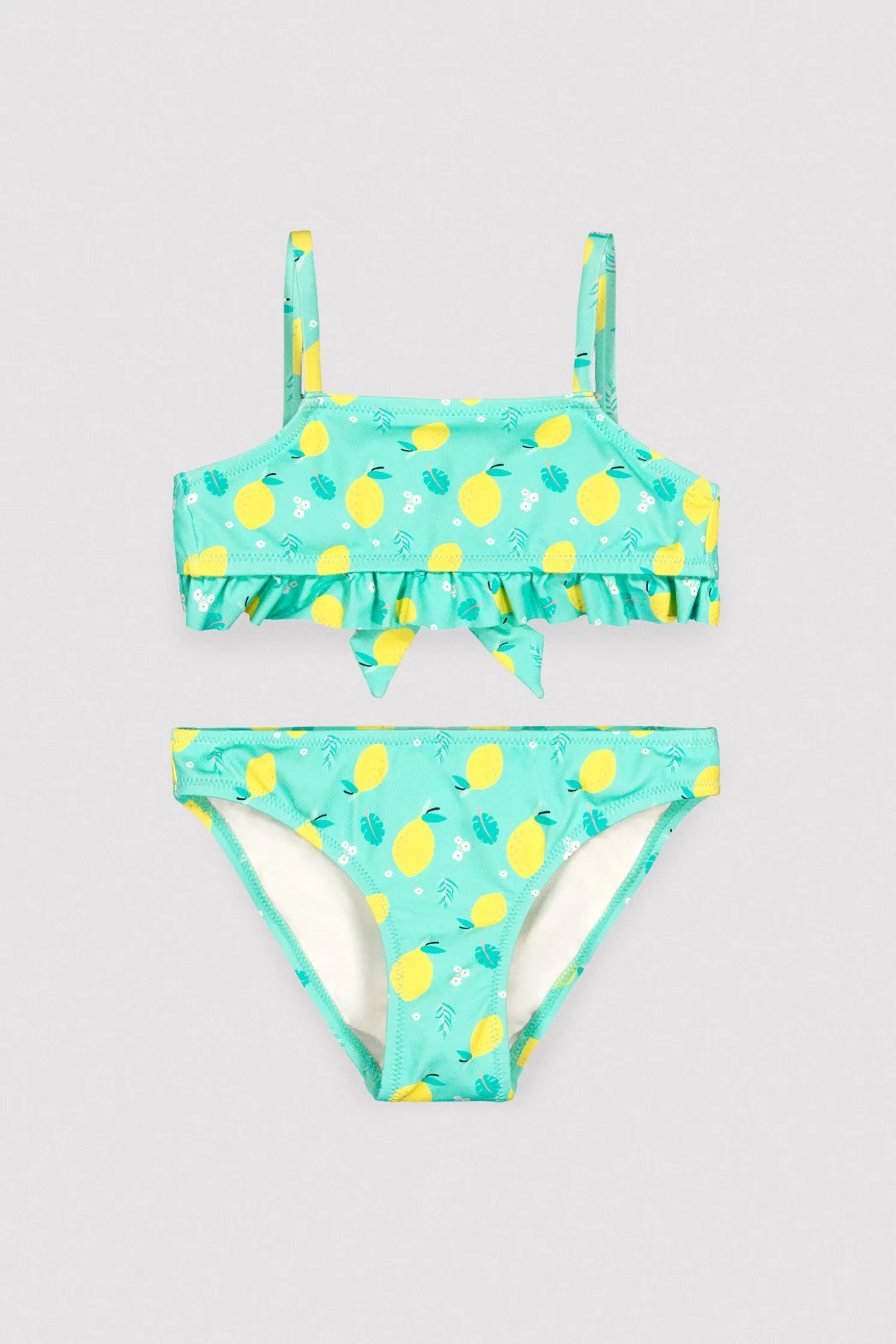 Bikini niña detalle volante estampado limones