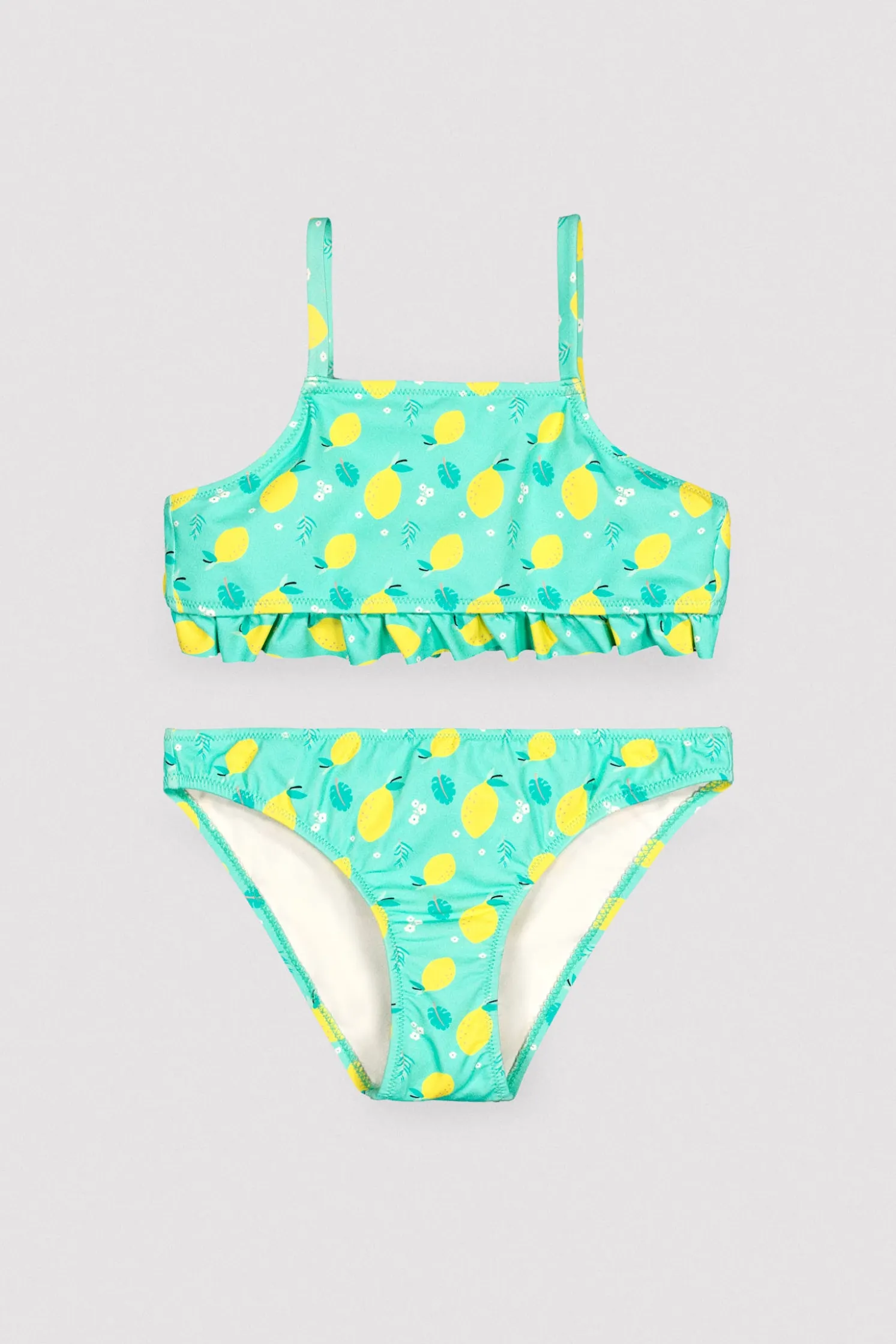 Bikini niña detalle volante estampado limones