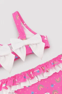Bikini niña detalle volantes y lazos estampado unicornios rosa