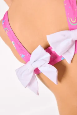Bikini niña detalle volantes y lazos estampado unicornios rosa