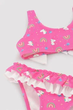 Bikini niña detalle volantes y lazos estampado unicornios rosa