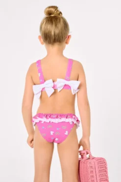 Bikini niña detalle volantes y lazos estampado unicornios rosa