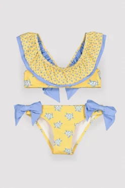 Bikini niña detalle volante y lazos estampado tortugas amarillo