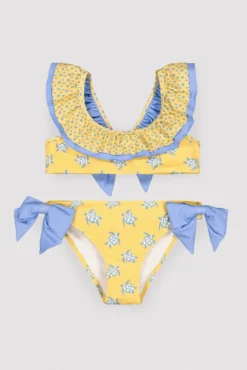 Bikini niña detalle volante y lazos estampado tortugas amarillo