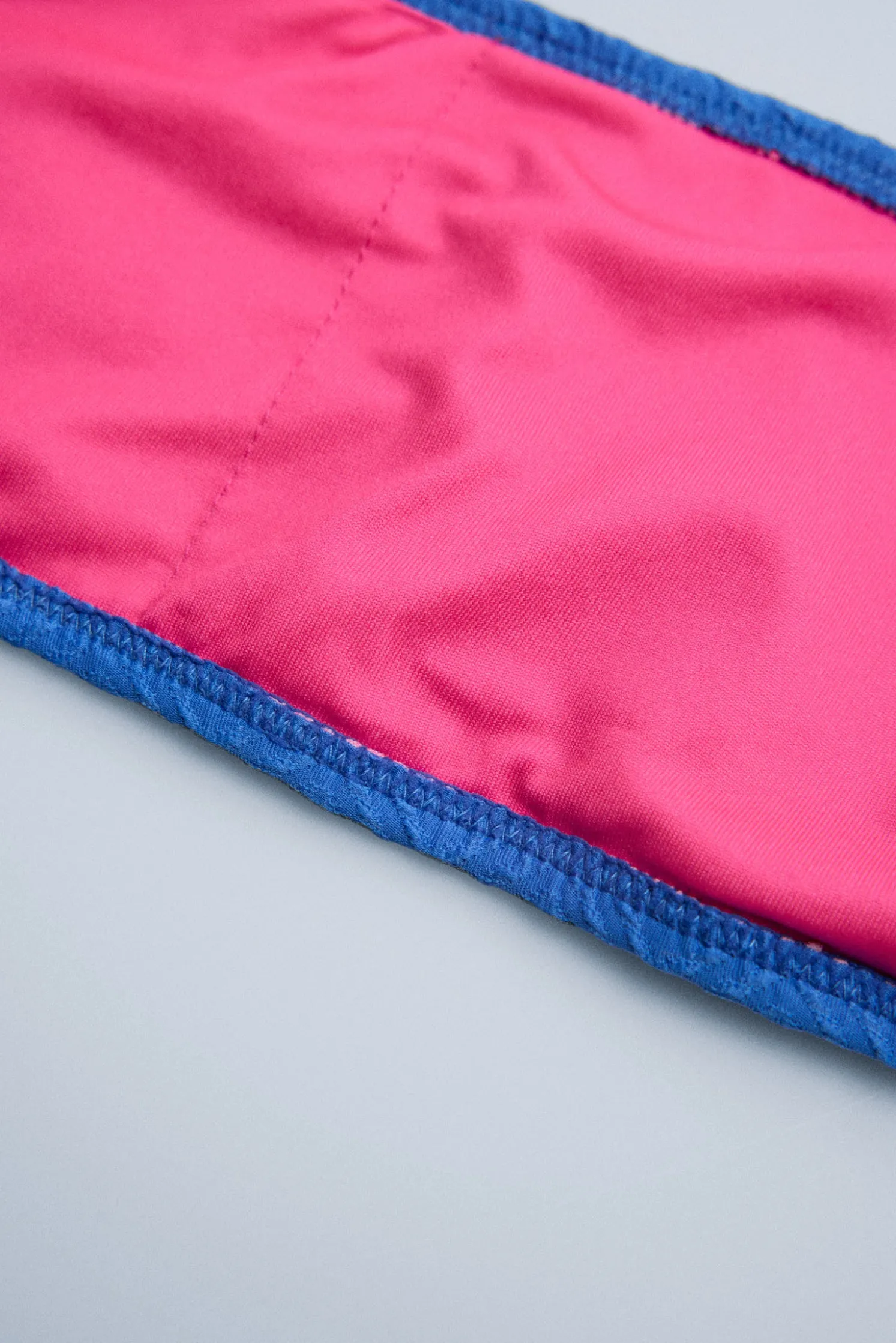 Braga bikini juvenil texturizada lisa fucsia