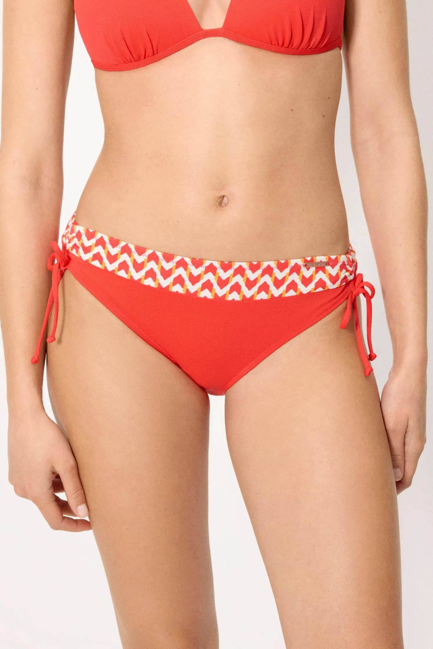 Braga bikini midi micropiqué estampada coral