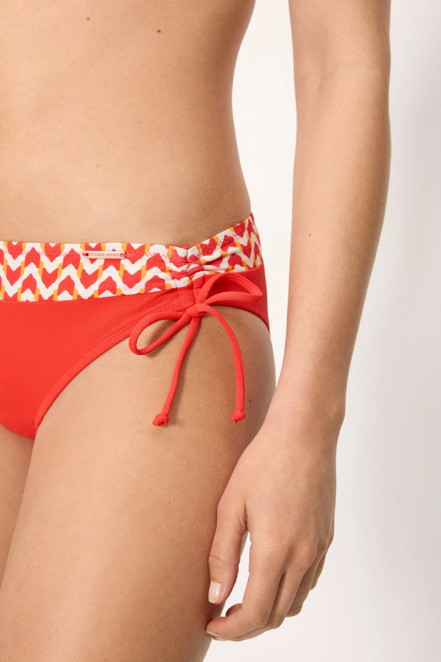 Braga bikini midi micropiqué estampada coral