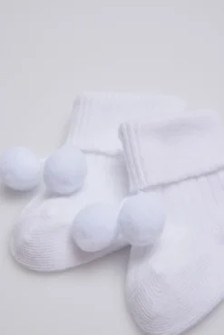 Calcetines canalé con borlas recién nacido blanco
