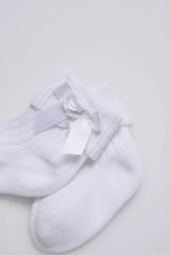 Calcetines canalé con lazo recién nacido blanco