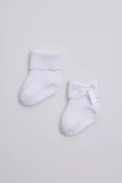Calcetines canalé con lazo recién nacido blanco