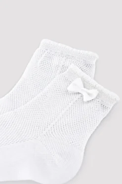 Calcetines infantiles calados detalle lazo blanco