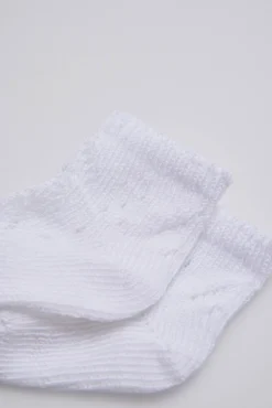 Calcetines perlé recién nacido blanco